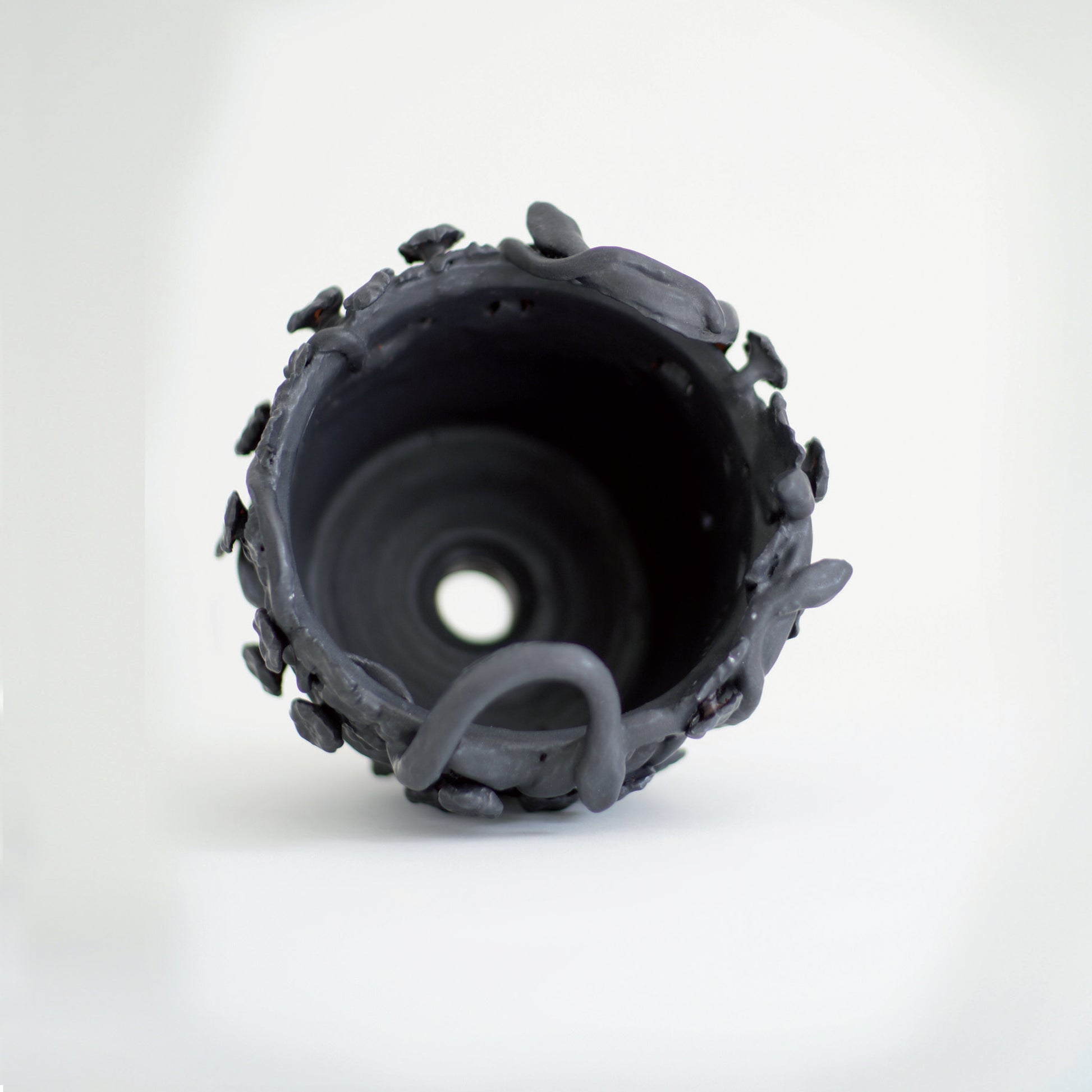 Cara Bauermeister Cerberus vase earthenware floral flowers black snakes pedestal