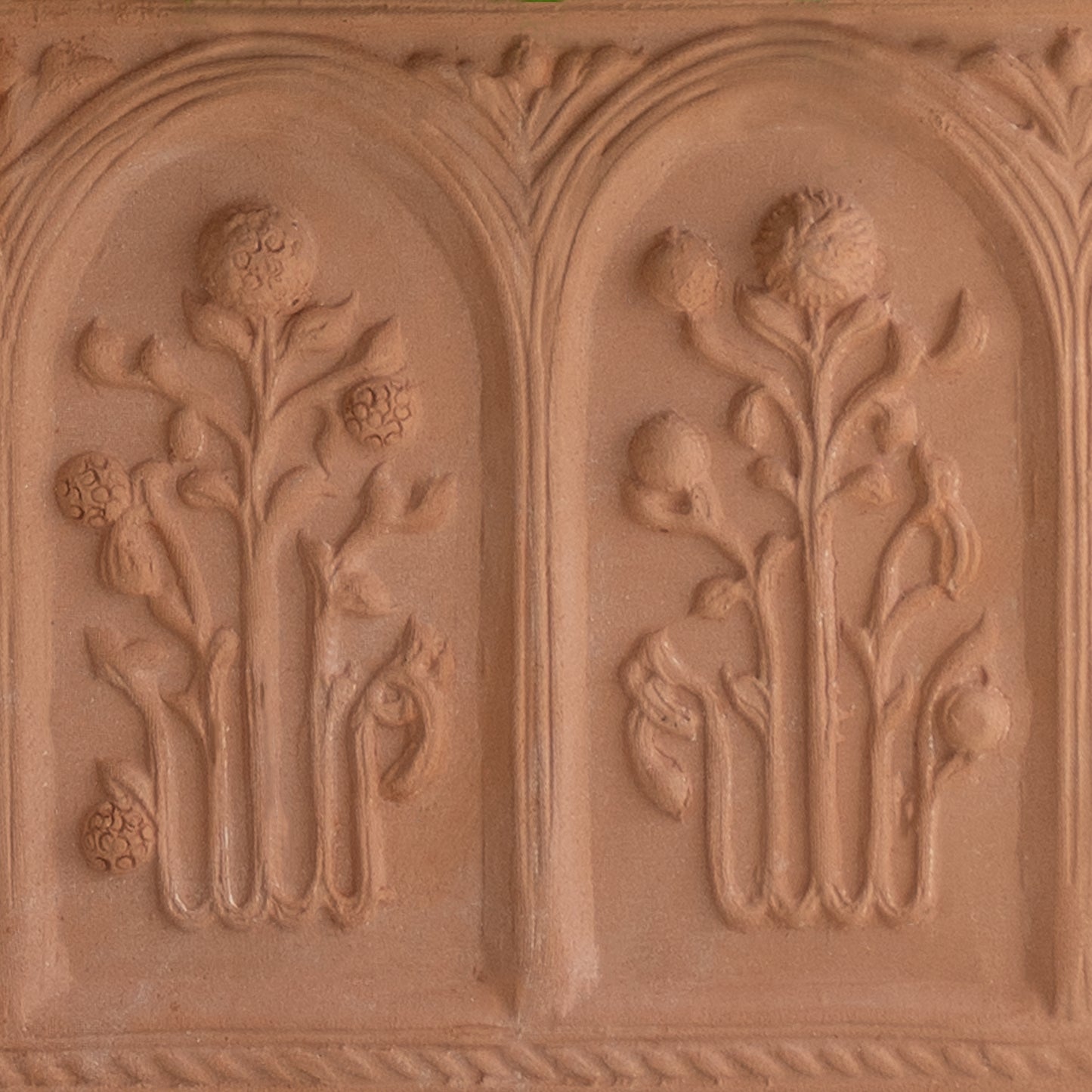 The Floral Folly Urn in Terracotta